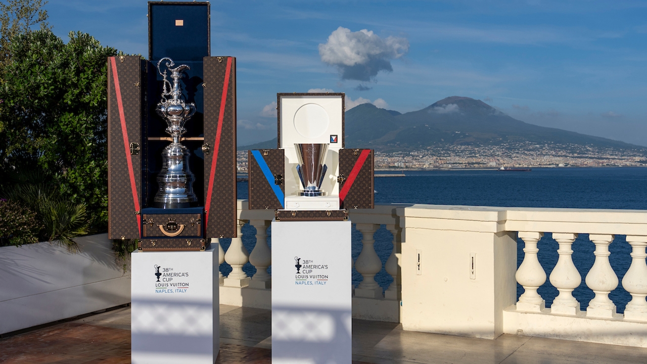 May 27, 2025. Louis Vuitton 38 America’s Cup. America’s Cup trophy and Louis Vuitton trophy  in Naples, Mount Vesuvius in the background.